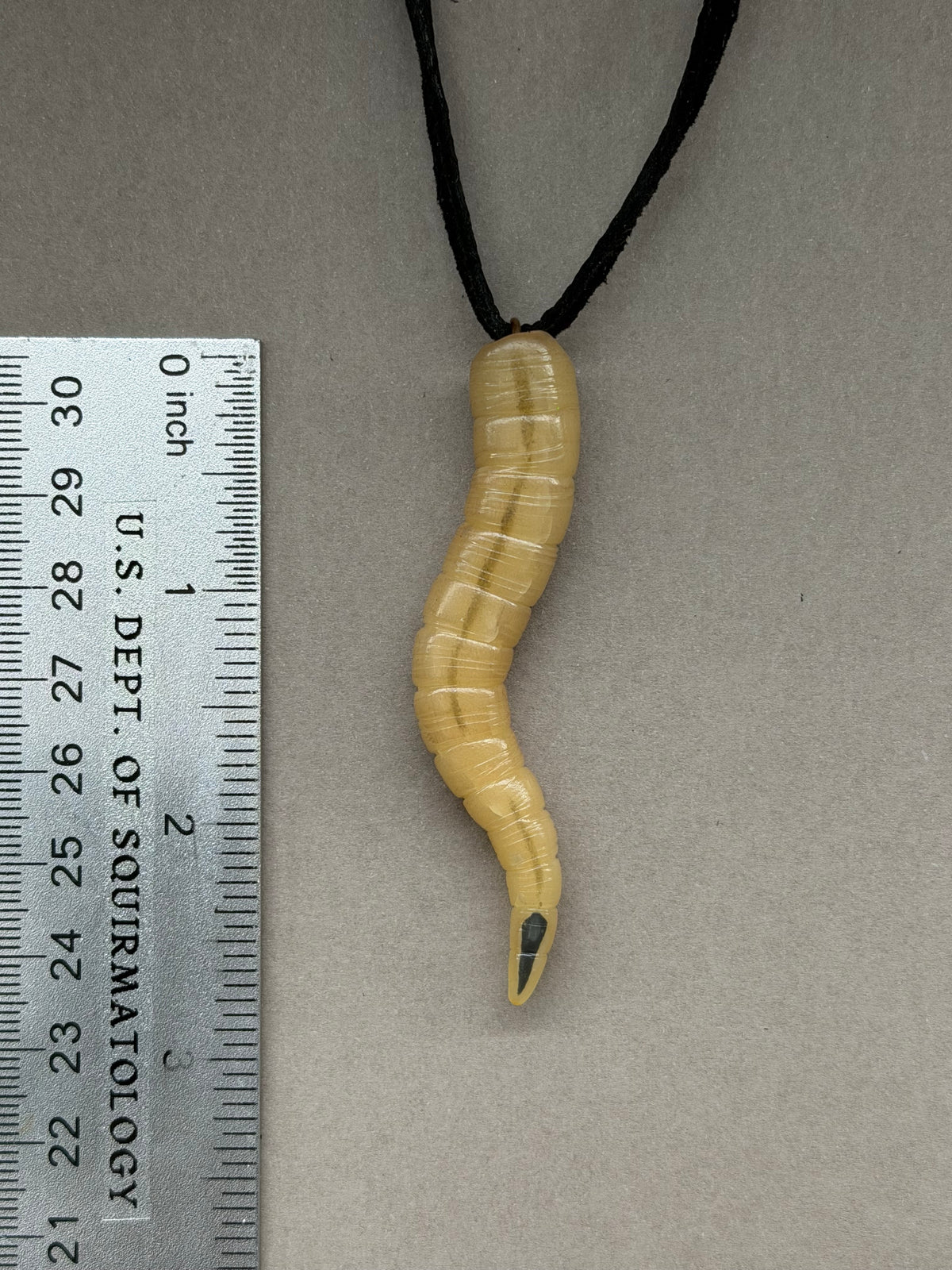 Magazine - Maggot Pendant 9