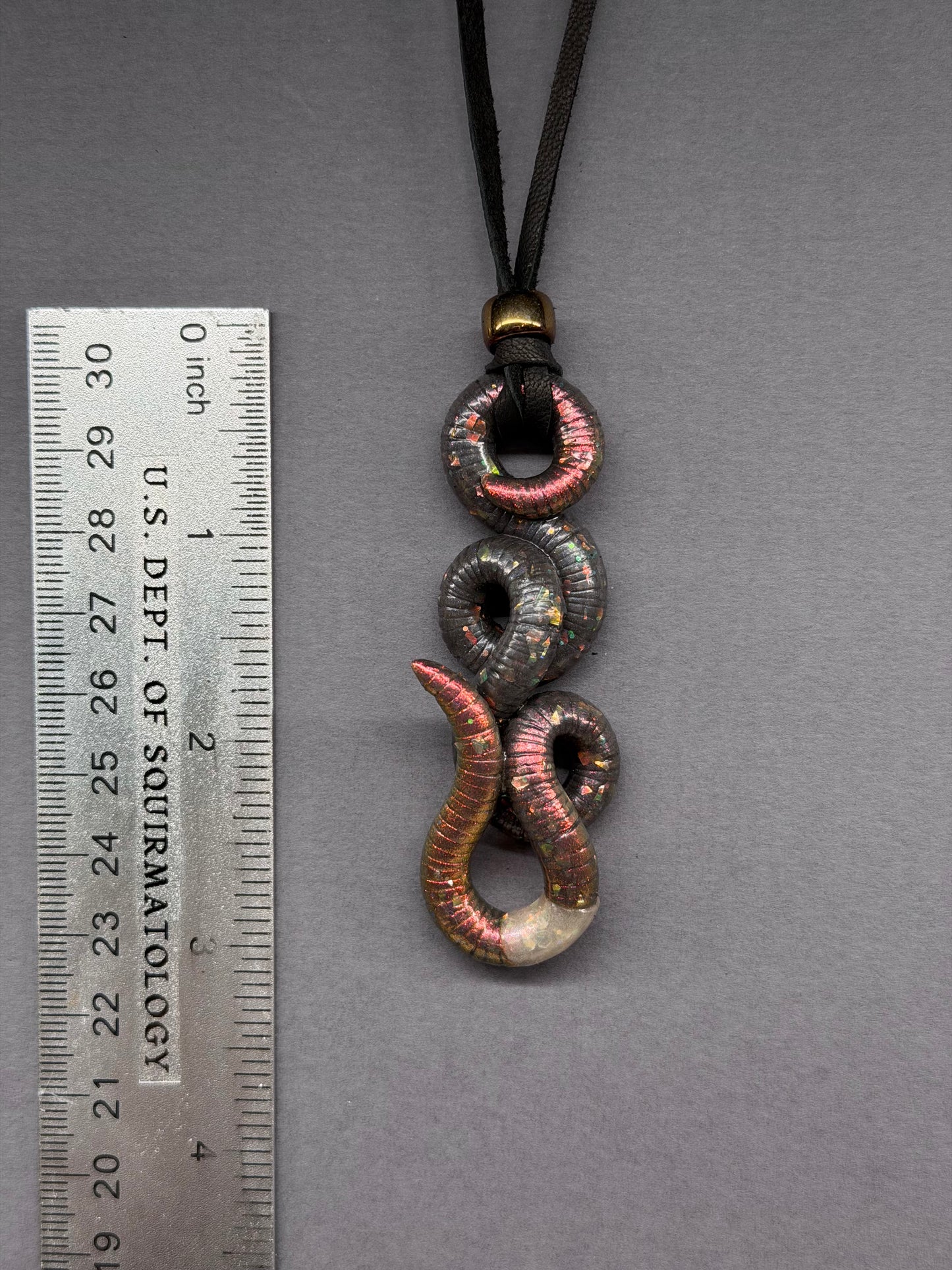 Chris Hemswormth - Metallic Black Opal Worm Pendant 29