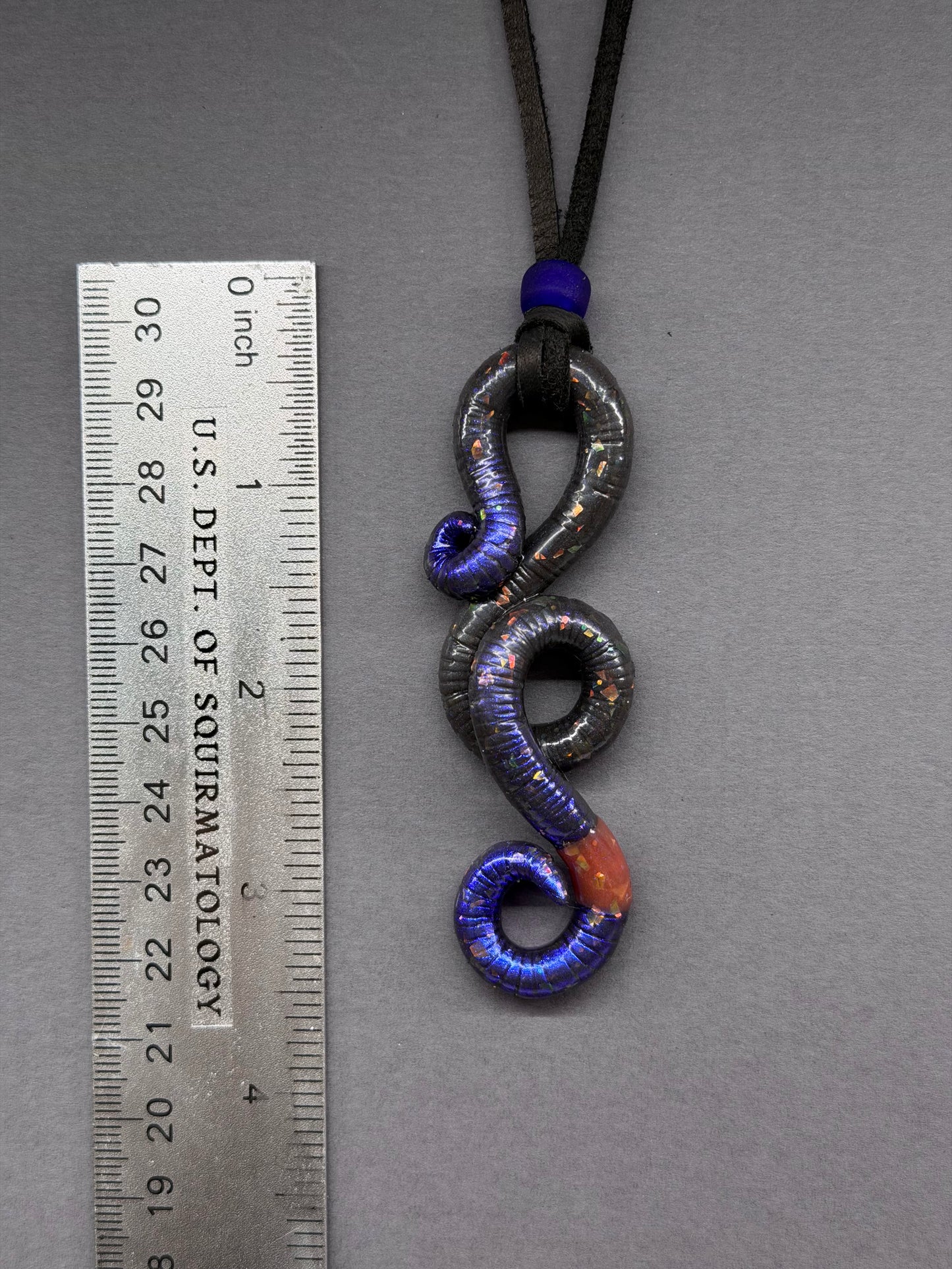 Dale Squirmheart - Metallic Black Opal Worm Pendant 30